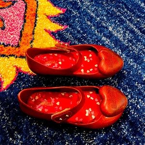 Mini Melissa red Velcro shoes. So cute! Great condition. Size 10